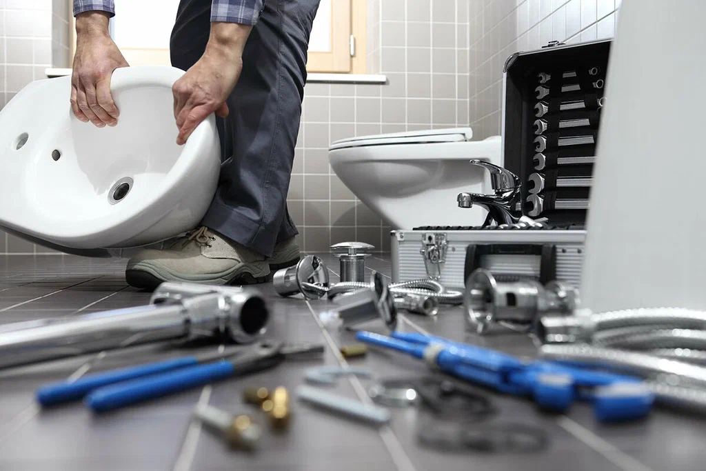 Plumbing tools prepared for a bathroom repair in Canton